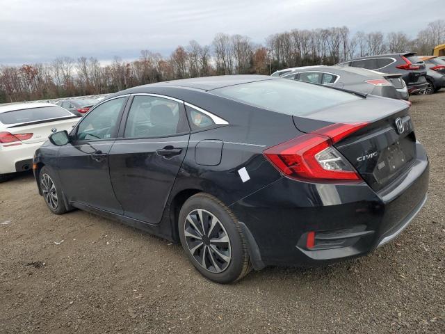 Photo 2 from auction – 2021 HONDA CIVIC with VIN 2HGFC2F68MH544449