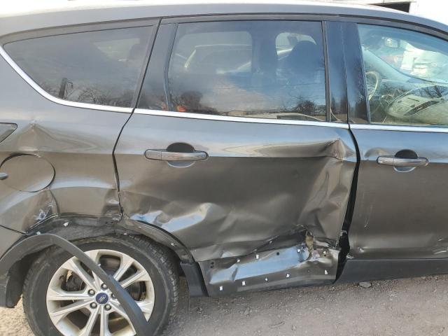 Photo 11 from auction – 2017 FORD ESCAPE with VIN 1FMCU9GD5HUB34016