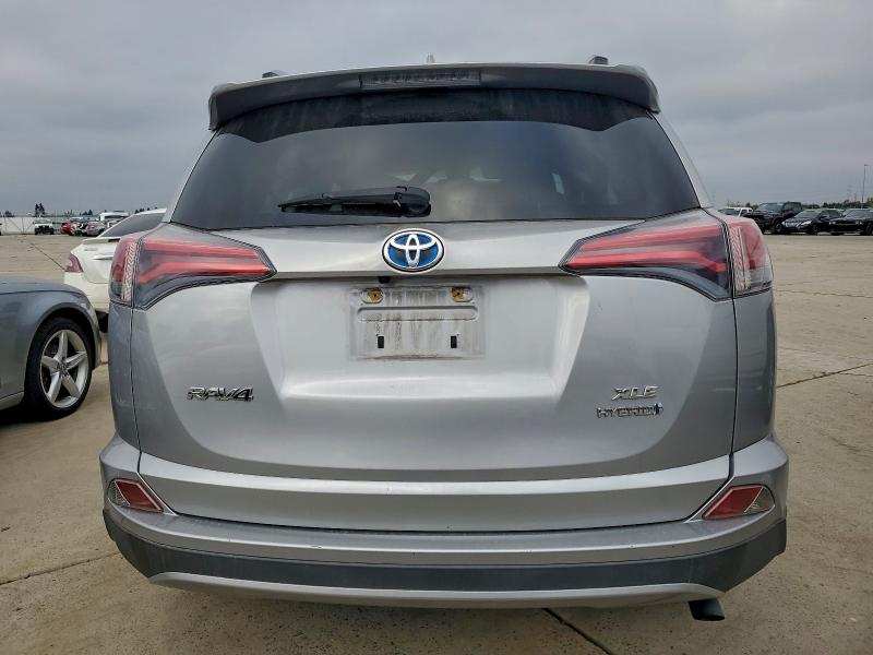 Photo 6 from auction – 2017 TOYOTA RAV4 HV LE with VIN JTMRJREV4HD065239