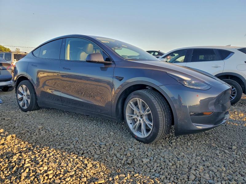 Photo 4 from auction – 2023 TESLA MODEL Y with VIN 7SAYGAEE3PF876486
