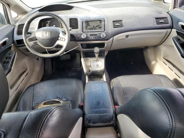 Photo 8 from auction – 2006 HONDA CIVIC HYBR with VIN JHMFA36246S002797