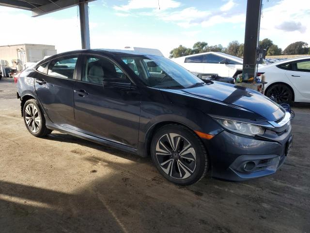 Photo 4 from auction – 2016 HONDA CIVIC EXL with VIN 19XFC1F76GE221468