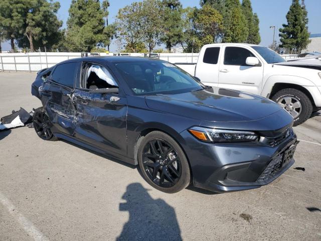 Photo 4 from auction – 2023 HONDA CIVIC SPOR with VIN 2HGFE2F58PH536230