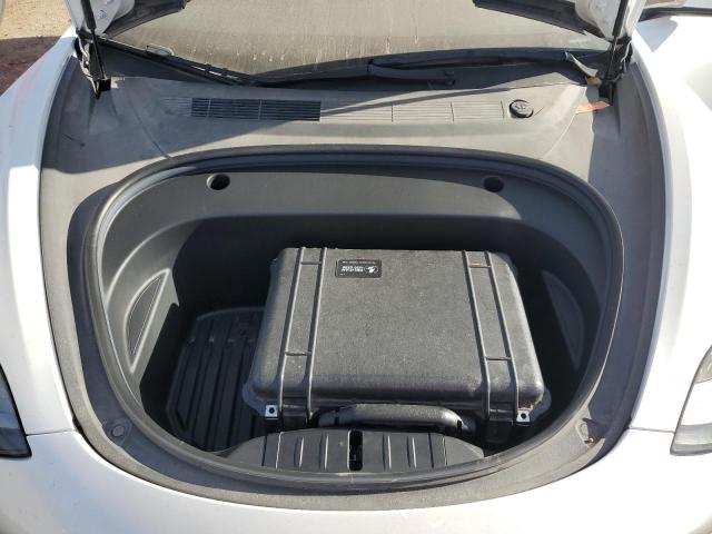 Photo 11 from auction – 2022 TESLA MODEL 3 with VIN 5YJ3E1EB4NF126496