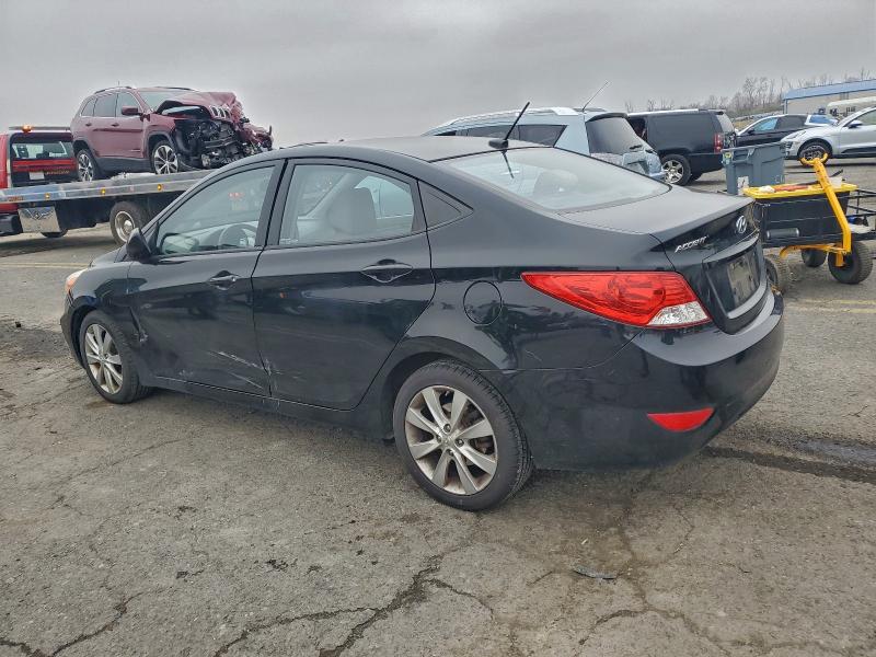 Photo 2 from auction – 2014 HYUNDAI ACCENT GLS with VIN KMHCU4AE7EU727649