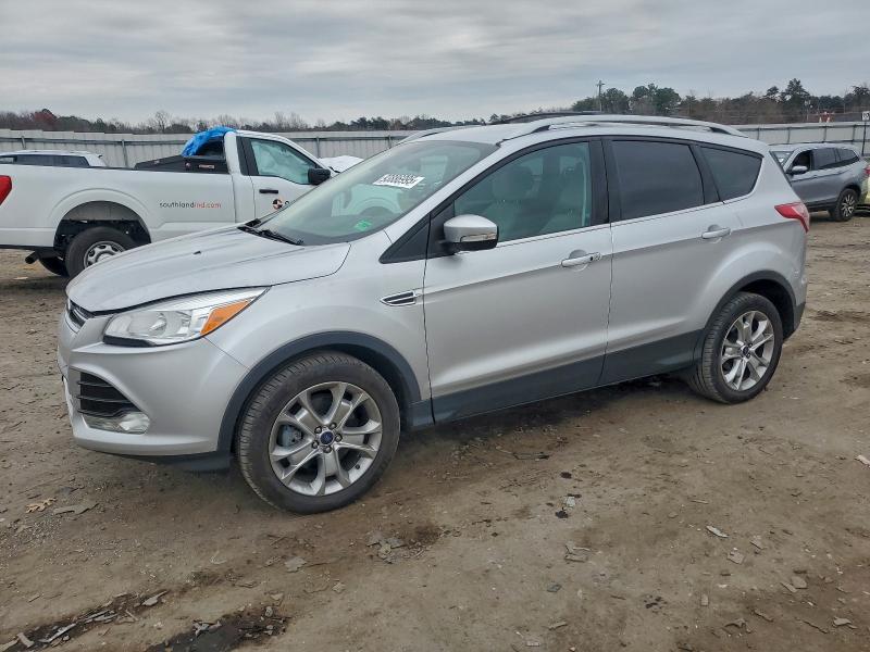 FORD ESCAPE TIT 2014 with VIN 1FMCU9J93EUB12807 - Photo from auction