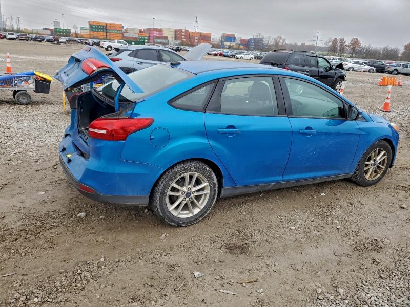 Photo 3 from auction – 2016 FORD FOCUS SE with VIN 1FADP3F25GL243020
