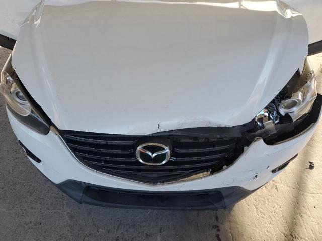 Photo 11 from auction – 2016 MAZDA CX-5 GT with VIN JM3KE2DY6G0897297