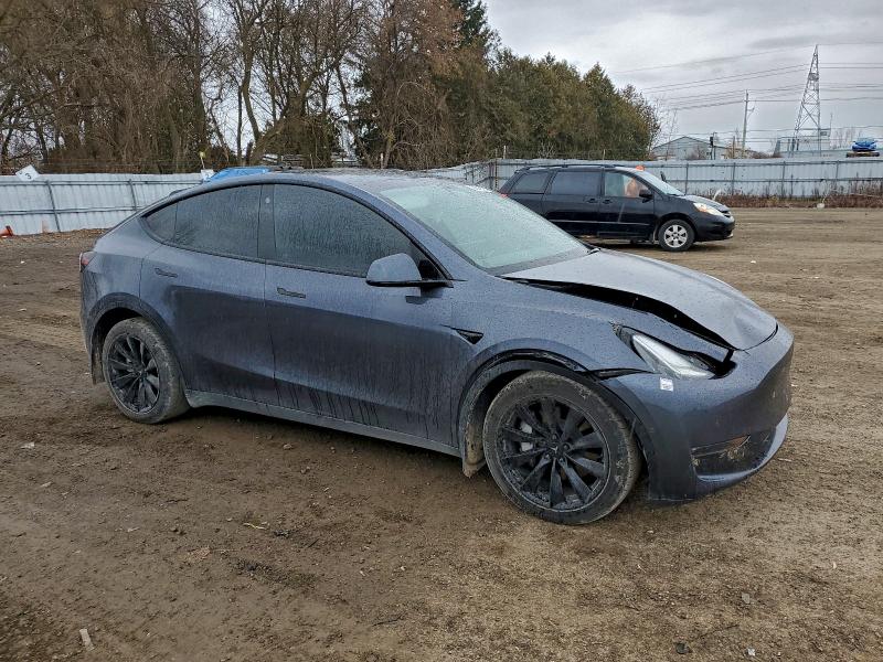 Photo 4 from auction – 2022 TESLA MODEL Y with VIN 7SAYGDEE3NF572587