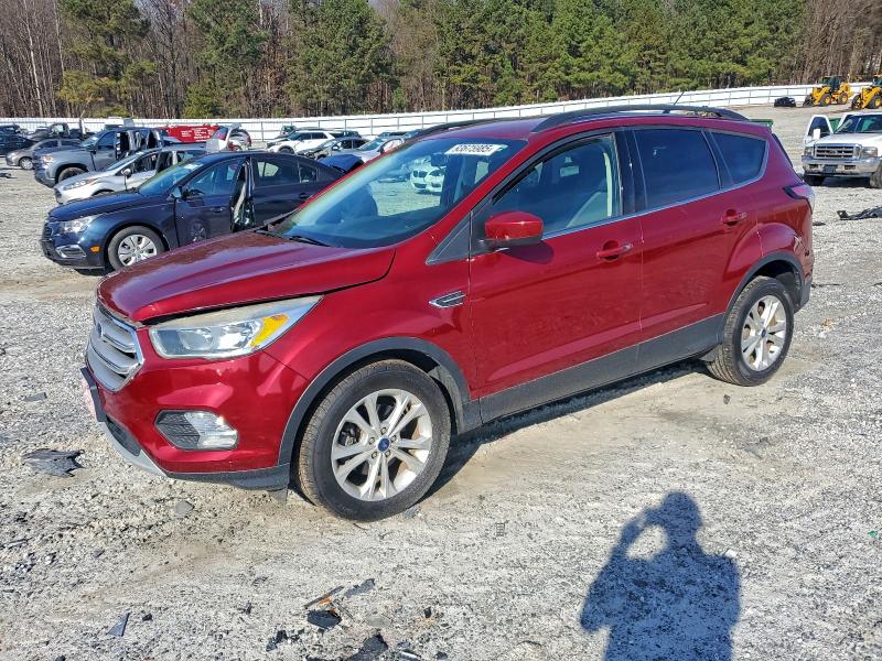 FORD ESCAPE SE 2018 with VIN 1FMCU0GD6JUB35466 - Photo from auction