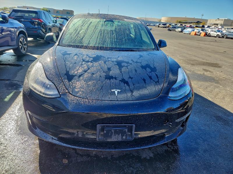 Photo 5 from auction – 2022 TESLA MODEL 3 with VIN 5YJ3E1EAXNF289161