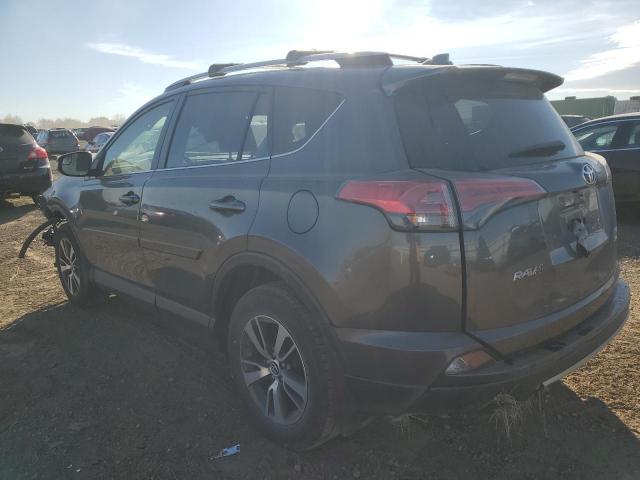 Photo 2 from auction – 2017 TOYOTA RAV4 XLE with VIN JTMRFREVXHJ131019