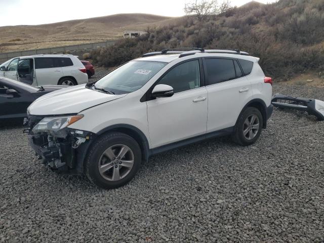 TOYOTA RAV4 XLE 2015 with VIN JTMWFREVXFD071094 - Photo from auction