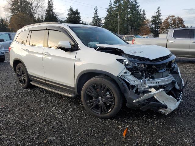 Photo 4 from auction – 2022 HONDA PILOT SE with VIN 5FNYF6H26NB035757