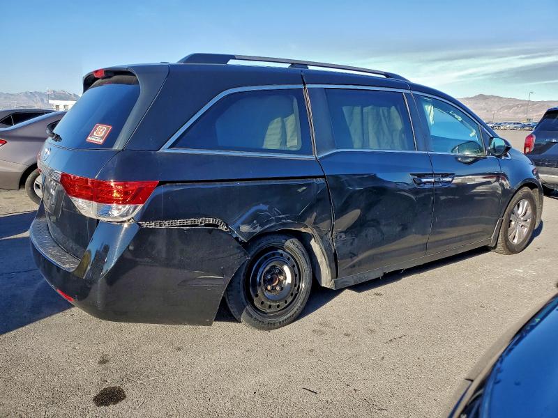 Photo 3 from auction – 2014 HONDA ODYSSEY with VIN 5FNRL5H61EB032677