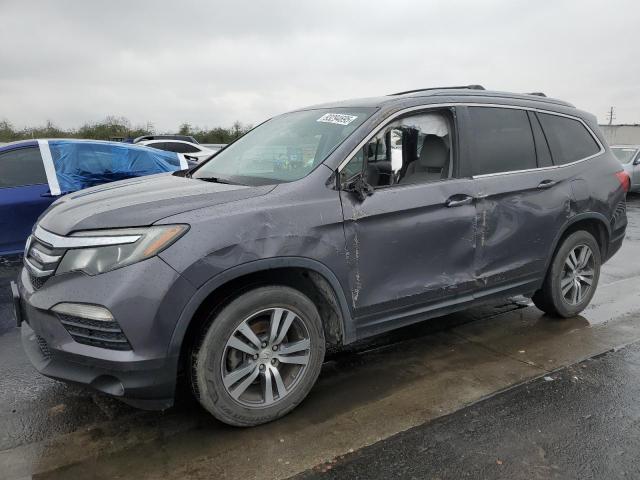 HONDA PILOT 2017 with VIN 5FNYF5H35HB023378 - Photo from auction