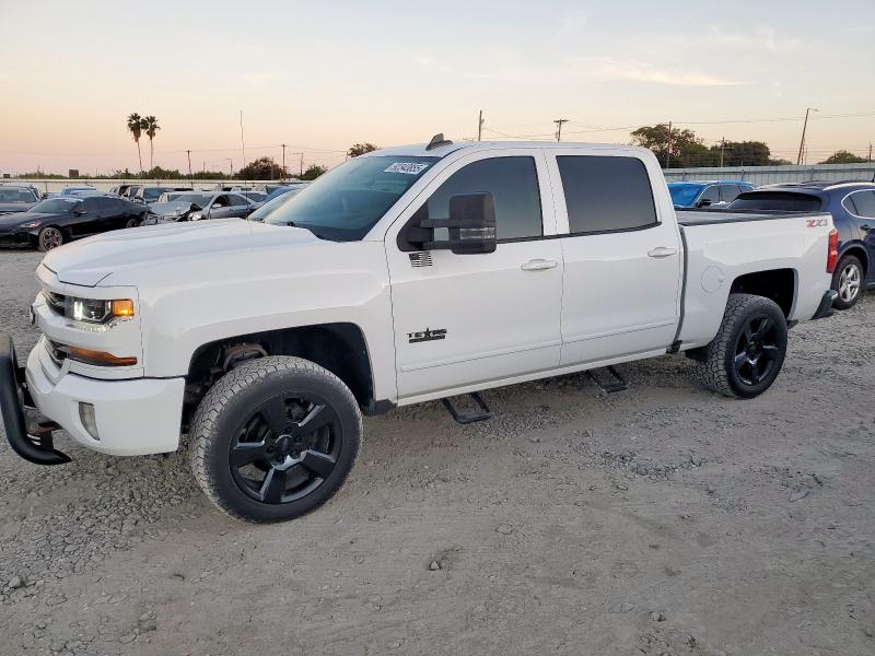 CHEVROLET SILVERADO 2018 with VIN 3GCUKREC9JG402390 - Photo from auction