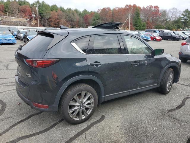 Photo 3 from auction – 2021 MAZDA CX-5 GRAND with VIN JM3KFBAYXM0452333