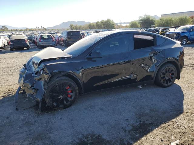 TESLA MODEL Y 2024 with VIN 7SAYGAEE0RF088994 - Photo from auction