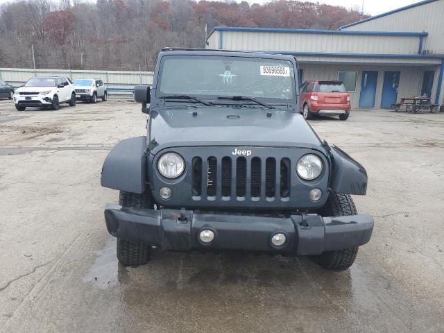 Photo 5 from auction – 2016 JEEP WRANGLER U with VIN 1C4BJWDG6GL220879