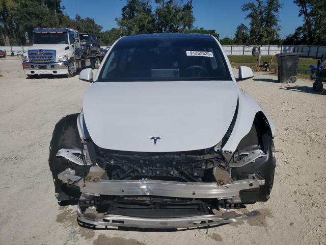 Photo 5 from auction – 2022 TESLA MODEL Y with VIN 7SAYGDEE1NF327903