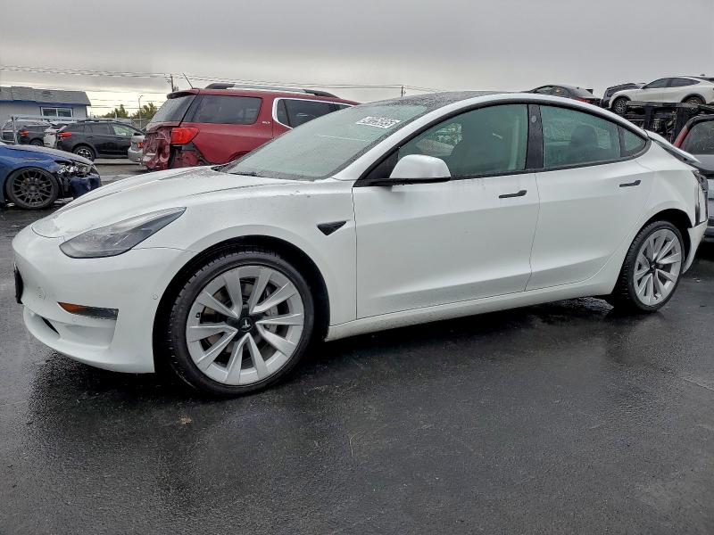 TESLA MODEL 3 2022 with VIN 5YJ3E1EB7NF298604 - Photo from auction