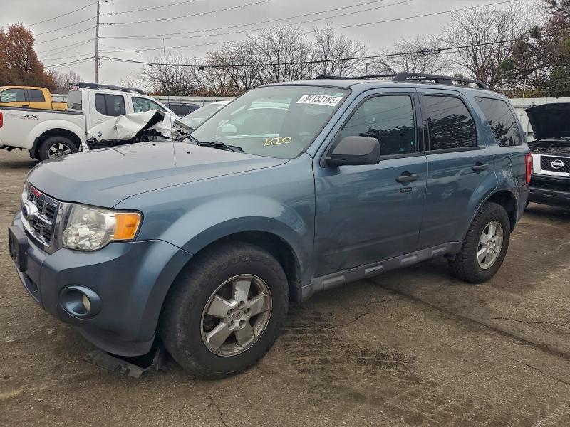 FORD ESCAPE XLT 2011 with VIN 1FMCU0D75BKC40396 - Photo from auction