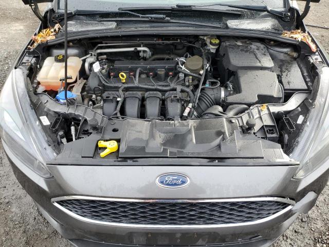 Photo 11 from auction – 2015 FORD FOCUS SE with VIN 1FADP3F23FL217188