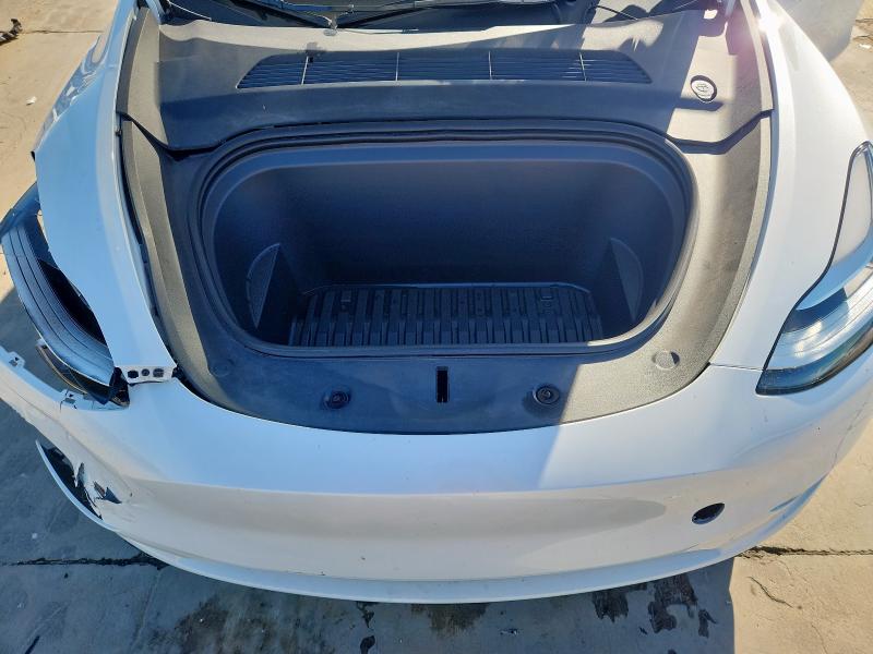 Photo 11 from auction – 2023 TESLA MODEL Y with VIN 7SAYGDEE9PA123303