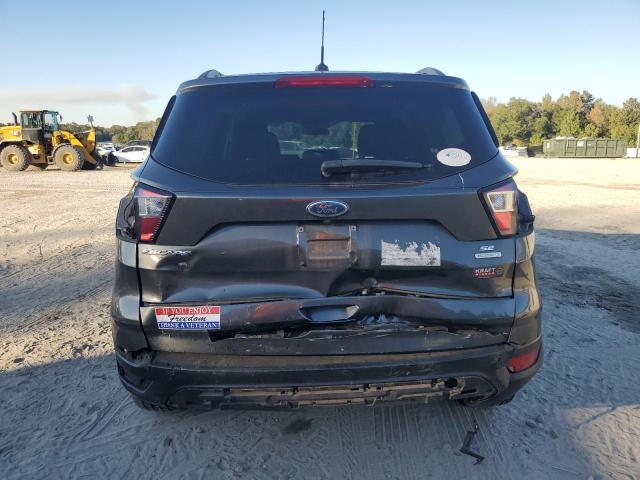 Photo 6 from auction – 2018 FORD ESCAPE SE with VIN 1FMCU0G97JUC20909