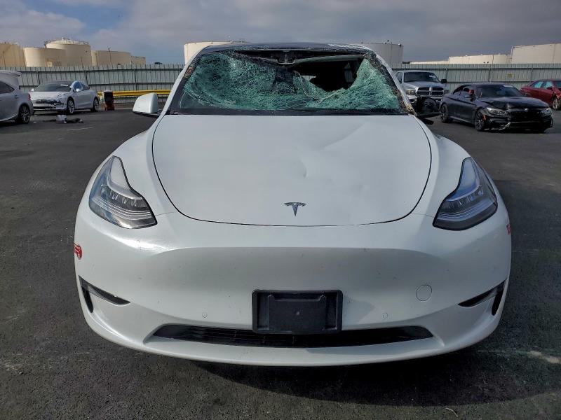 Photo 5 from auction – 2022 TESLA MODEL Y with VIN 7SAYGDEE1NF571499