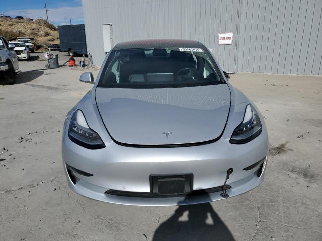 Photo 5 from auction – 2018 TESLA MODEL 3 with VIN 5YJ3E1EA8JF010381
