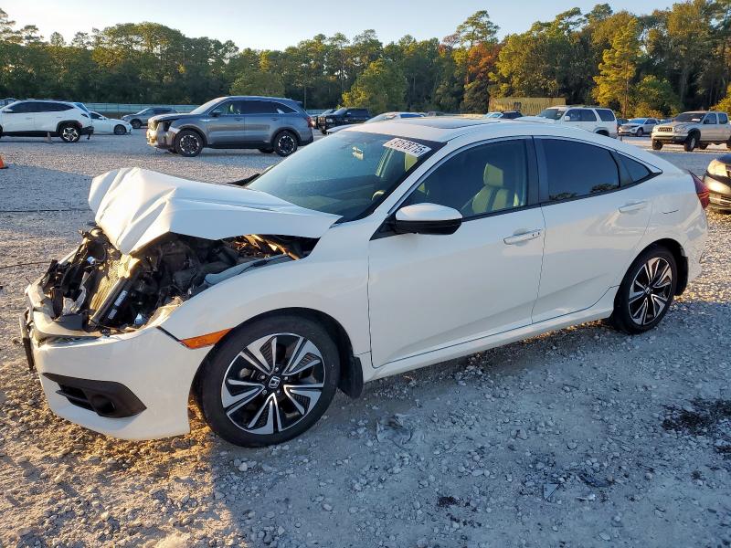 HONDA CIVIC EX 2017 with VIN 19XFC1F31HE005624 - Photo from auction