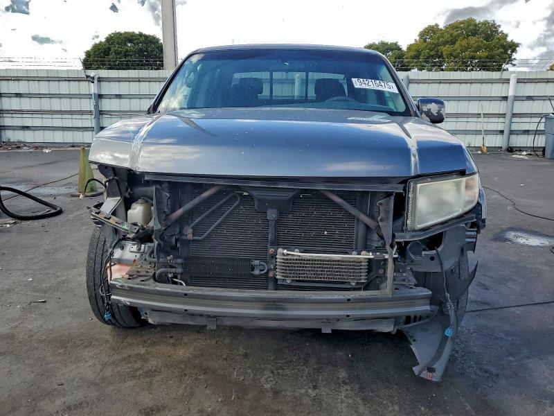 Photo 5 from auction – 2011 HONDA RIDGELINE with VIN 5FPYK1F44BB451344