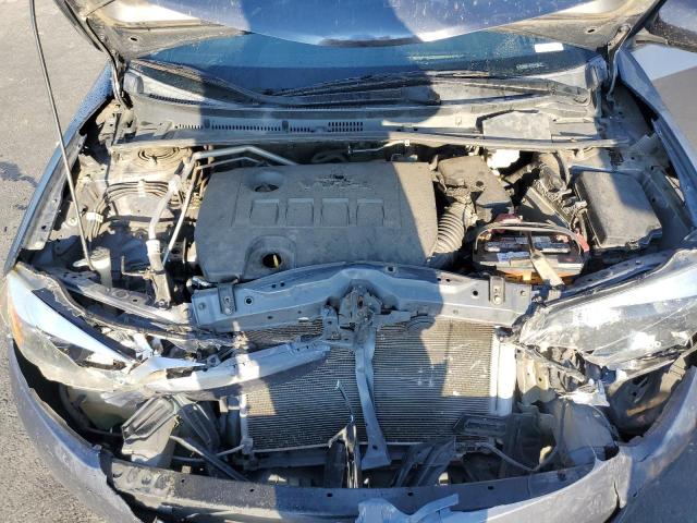 Photo 11 from auction – 2014 TOYOTA COROLLA L with VIN 5YFBURHEXEP113193