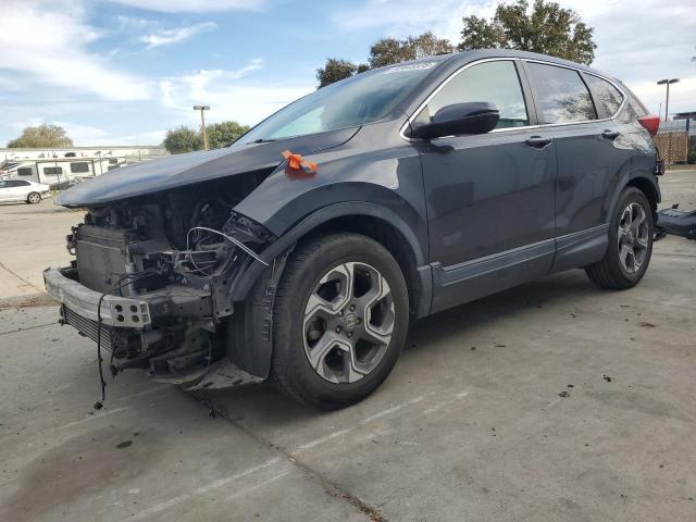 HONDA CR-V EXL 2018 with VIN 7FARW1H86JE049331 - Photo from auction