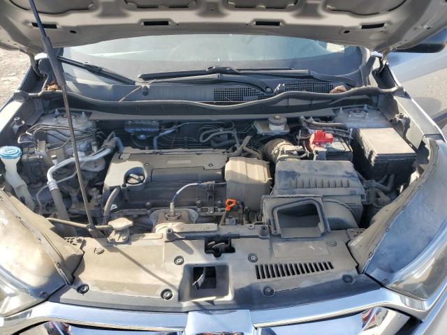 Photo 11 from auction – 2017 HONDA CR-V with VIN 5J6RW6H37HL007636
