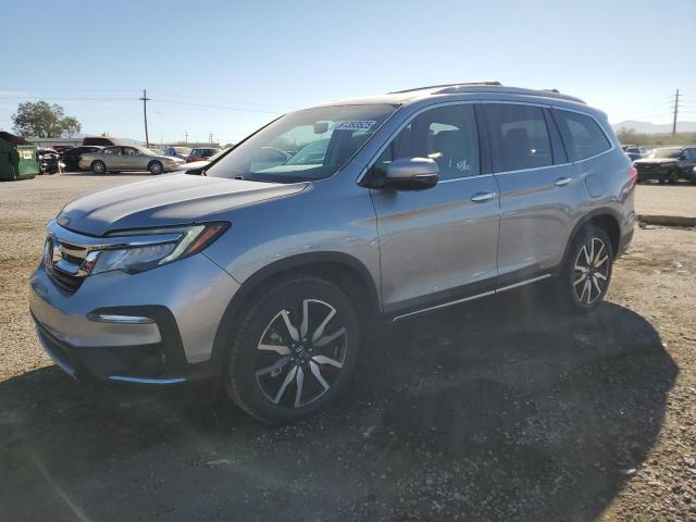 HONDA PILOT TOUR 2020 with VIN 5FNYF6H67LB016599 - Photo from auction