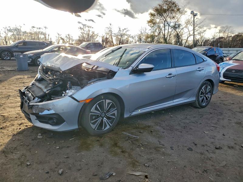 HONDA CIVIC EX 2018 with VIN JHMFC1F37JX008872 - Photo from auction