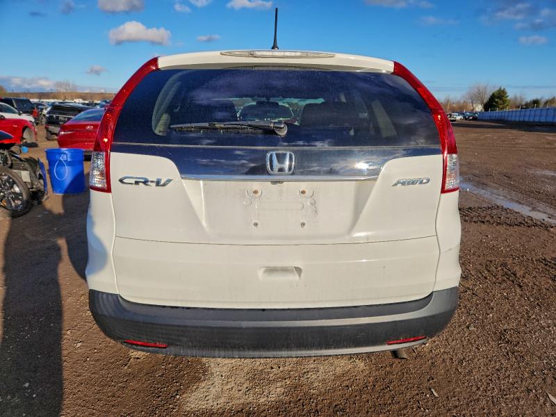 Photo 6 from auction – 2012 HONDA CR-V LX with VIN 2HKRM4H36CH110284