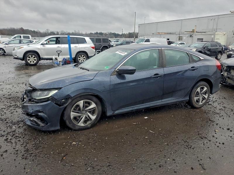 HONDA CIVIC LX 2019 with VIN 19XFC2F60KE007937 - Photo from auction