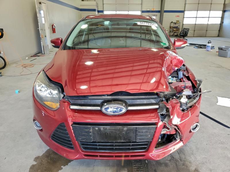 Photo 5 from auction – 2014 FORD FOCUS with VIN 1FADP3J21EL104555