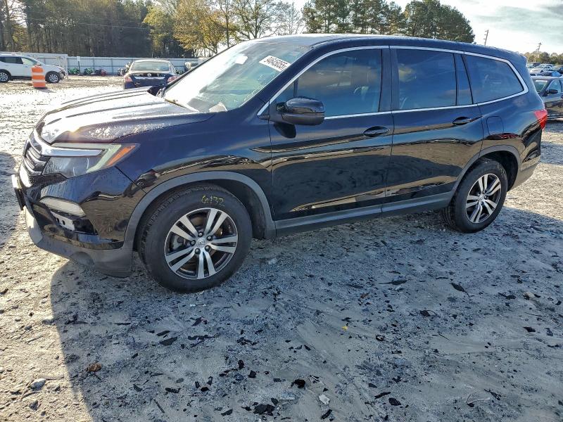 HONDA PILOT EXL 2016 with VIN 5FNYF5H59GB042158 - Photo from auction