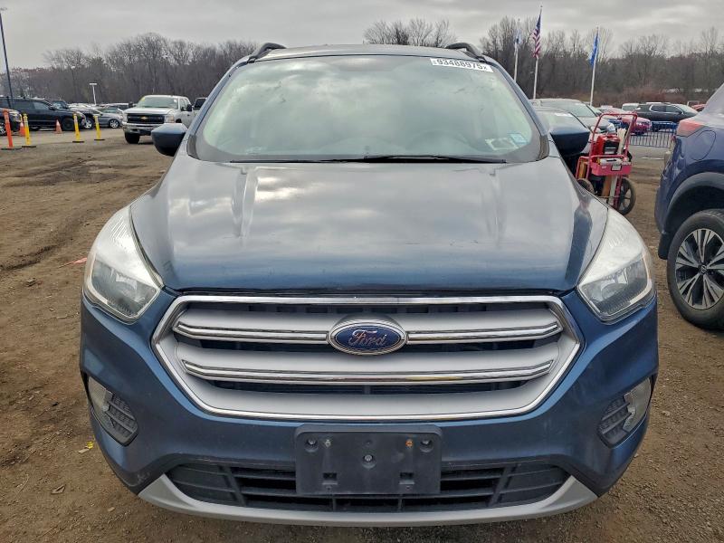 Photo 5 from auction – 2018 FORD ESCAPE with VIN 1FMCU9GD6JUA29197