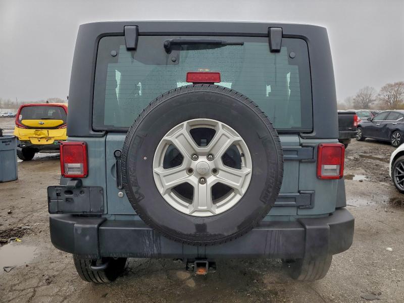 Photo 6 from auction – 2014 JEEP WRANGLER S with VIN 1C4AJWAGXEL178701
