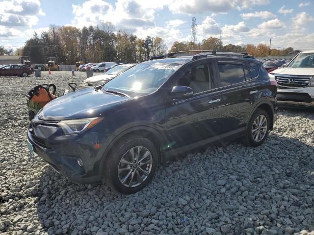TOYOTA RAV4 2018 with VIN JTMDFREV1JD241827 - Photo from auction