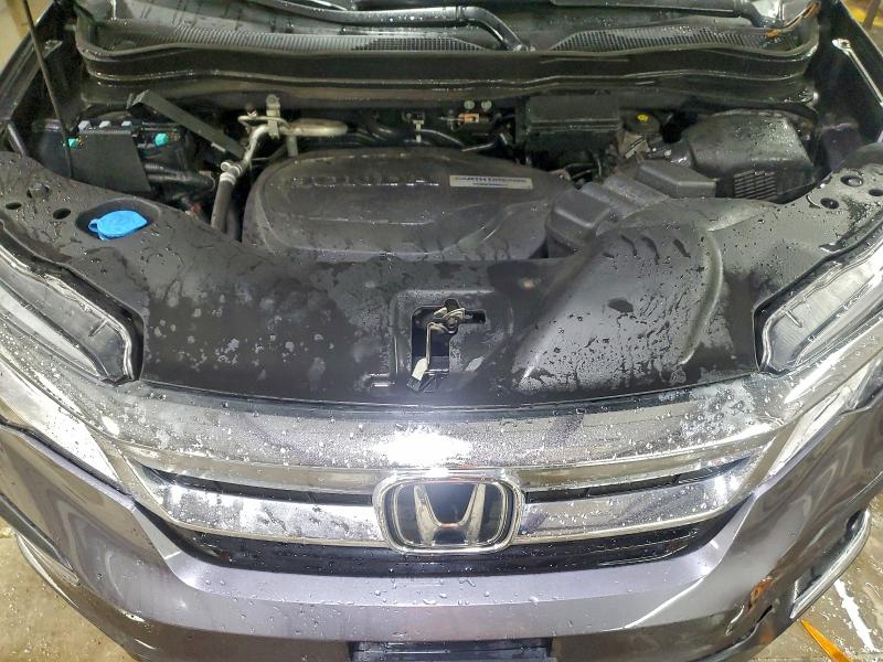 Photo 12 from auction – 2019 HONDA PILOT ELIT with VIN 5FNYF6H00KB021038