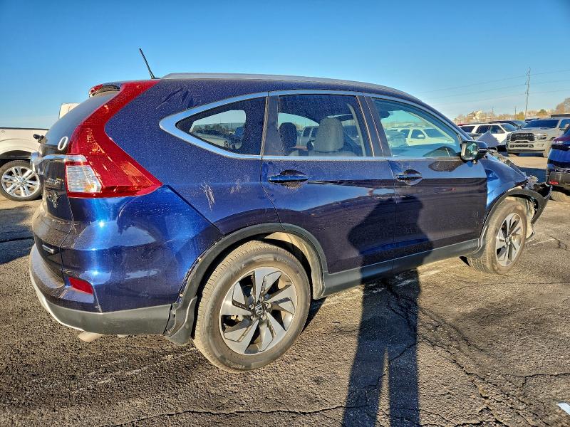 Photo 3 from auction – 2015 HONDA CR-V TOURI with VIN 5J6RM4H95FL124434