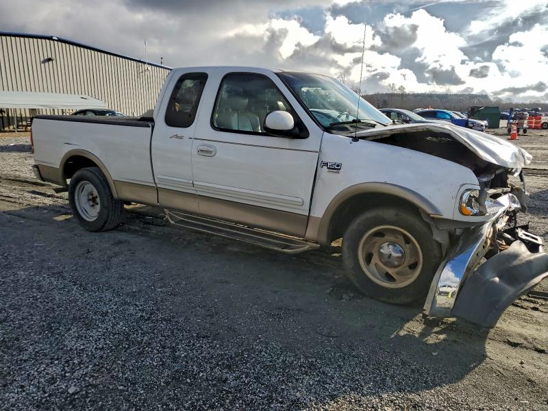 Photo 4 from auction – 2002 FORD F150 with VIN 1FTRX17L12NA75756