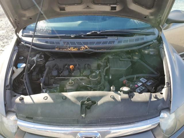 Photo 11 from auction – 2006 HONDA CIVIC LX with VIN JHMFA15556S005885